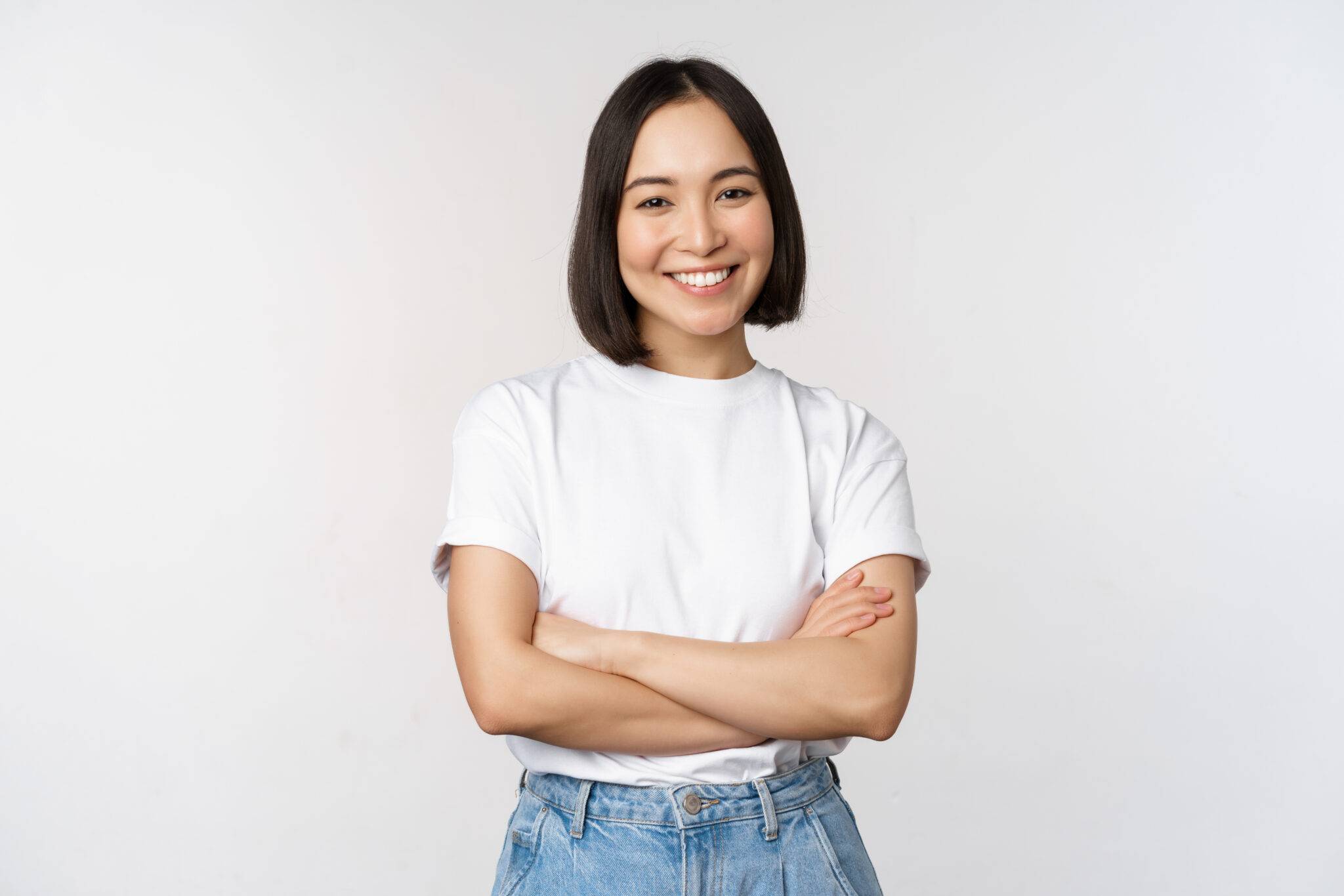 a woman with her arms crossed