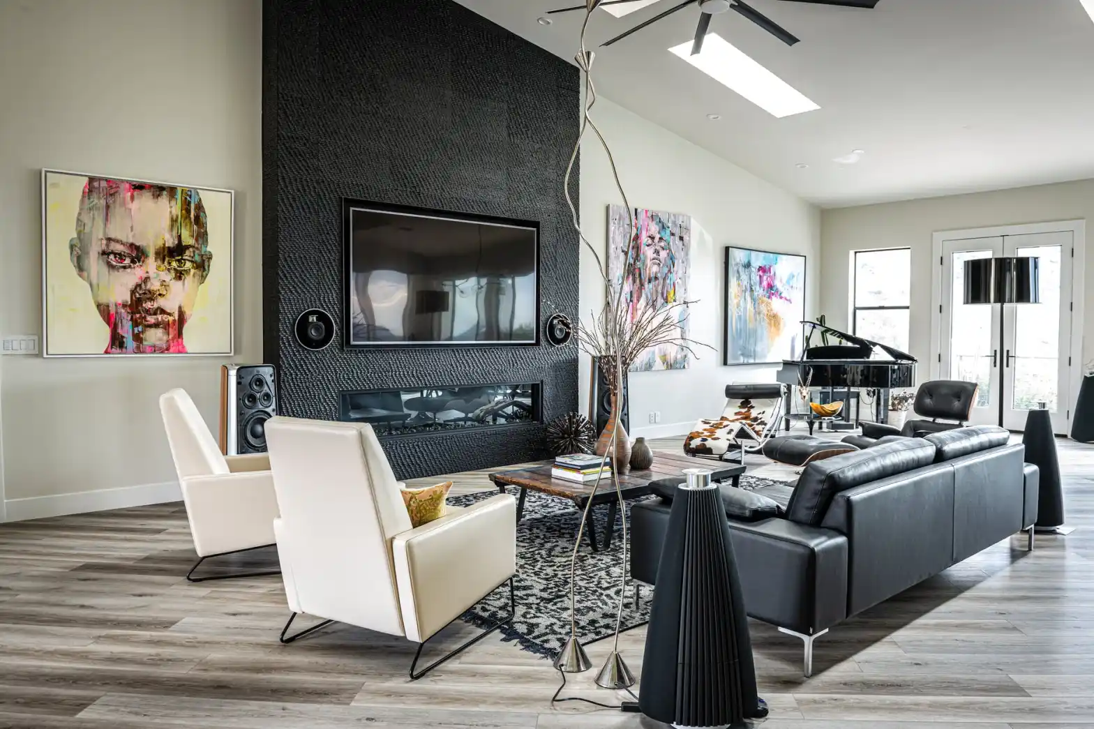 Modern lounge with cream and black leather furniture